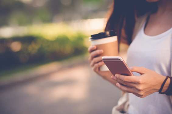 Simple Financial Tips for Young Adults Young Women on Cell Phone